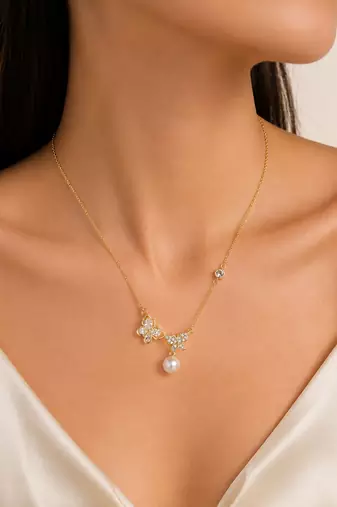 Gold-tone butterfly crystal pearl drop pendant necklace