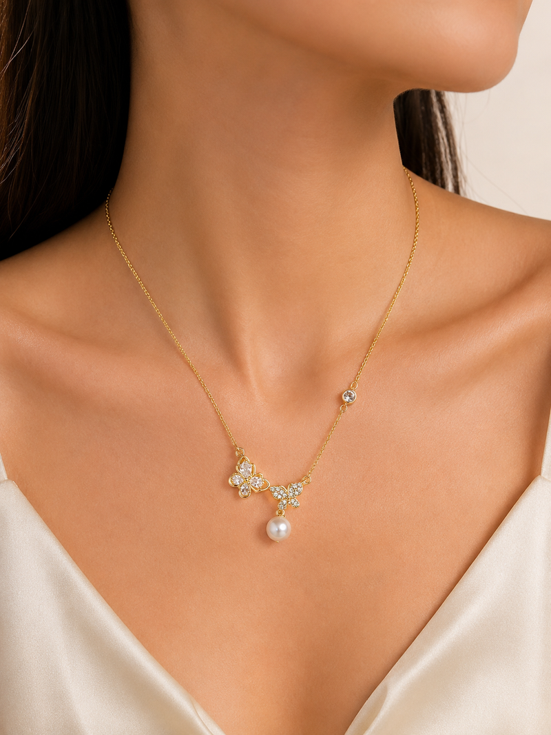 Gold-tone butterfly crystal pearl drop pendant necklace