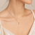Pearl pendant necklace with gold-tone chain, white