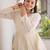Off- White Cora Cotton Gota-Patti & Lace work Peplum Blouse With Flared Lehenga