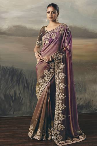 Shaded wine heavy designer border with designer blouse wedding wear saree