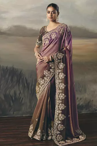 Shaded wine heavy designer border with designer blouse wedding wear saree