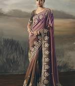 Shaded wine heavy designer border with designer blouse wedding wear saree
