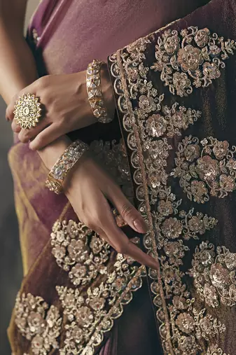 Shaded wine heavy designer border with designer blouse wedding wear saree