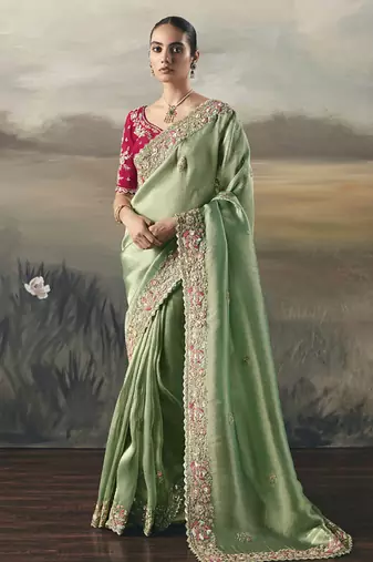 Pista  designer border with designer blouse wedding wear saree