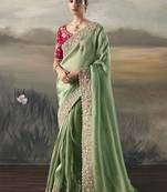 Pista  designer border with designer blouse wedding wear saree