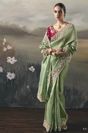Pista  designer border with designer blouse wedding wear saree
