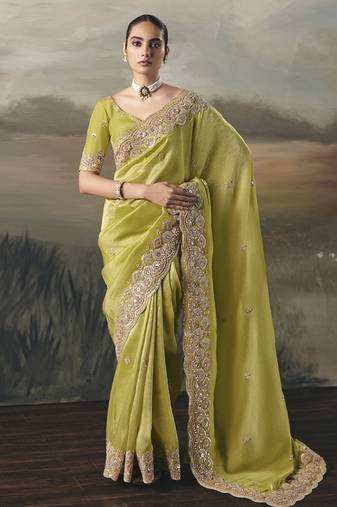 Light pear designer border with designer blouse wedding wear saree