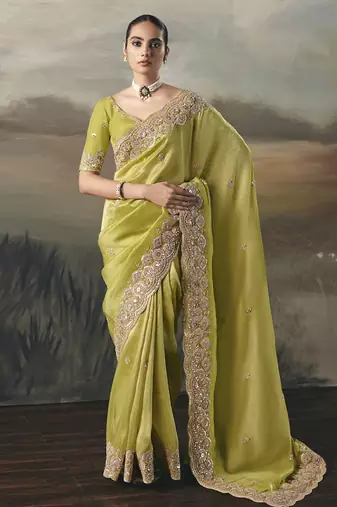 Light pear designer border with designer blouse wedding wear saree