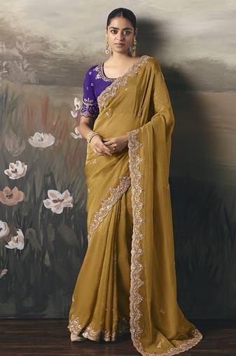 Mustard designer border with designer blouse wedding wear saree