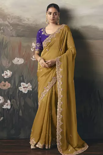 Mustard designer border with designer blouse wedding wear saree