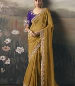 Mustard designer border with designer blouse wedding wear saree