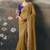 Mustard designer border with designer blouse wedding wear saree