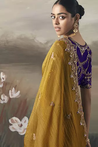 Mustard designer border with designer blouse wedding wear saree