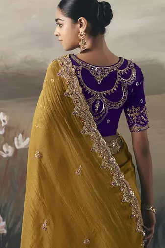 Mustard designer border with designer blouse wedding wear saree