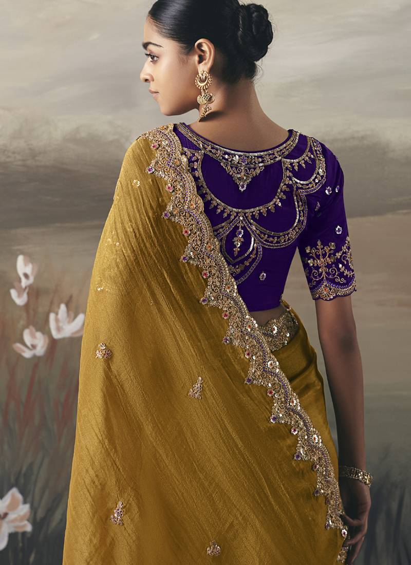 Mustard designer border with designer blouse wedding wear saree