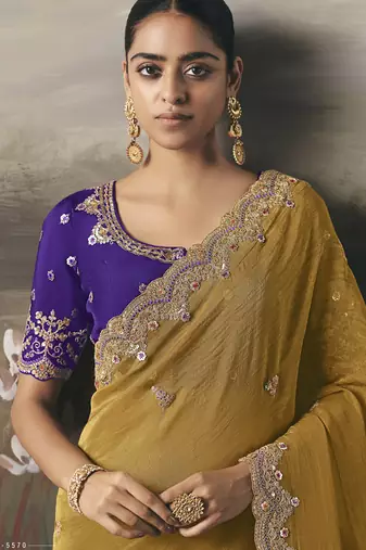Mustard designer border with designer blouse wedding wear saree
