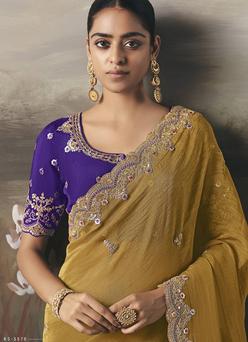 Mustard designer border with designer blouse wedding wear saree