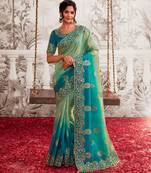 Celebrity type rama shaded multi work  viscose tissue saree with unstitched blouse