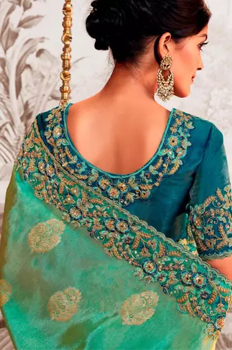 Celebrity type rama shaded multi work  viscose tissue saree with unstitched blouse