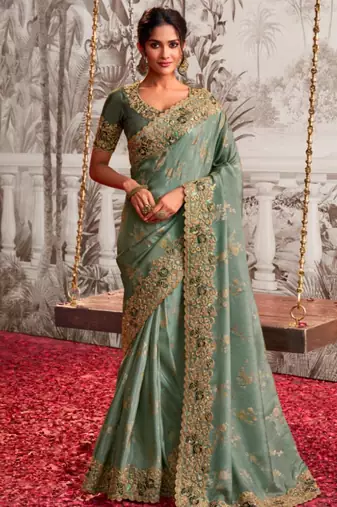 Embellished light green resham & zari embroidery  viscose tissue saree with unstitched blouse