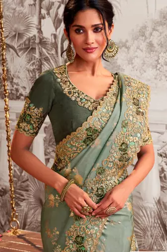 Embellished light green resham & zari embroidery  viscose tissue saree with unstitched blouse