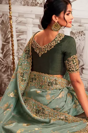 Embellished light green resham & zari embroidery  viscose tissue saree with unstitched blouse