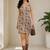 Beige color floral printed sleeveless mini dress