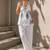 White color printed sleeveless v neck tunic