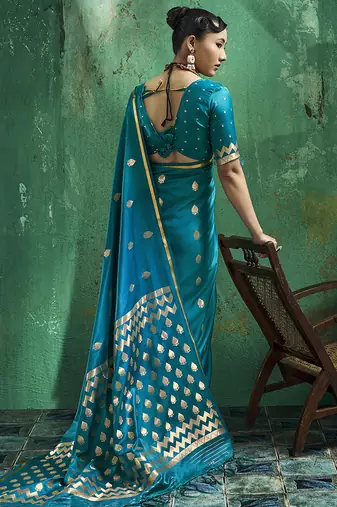 Teal blue satin silk blend saree with gold zari buti