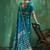 Teal blue satin silk blend saree with gold zari buti