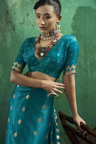 Teal blue satin silk blend saree with gold zari buti