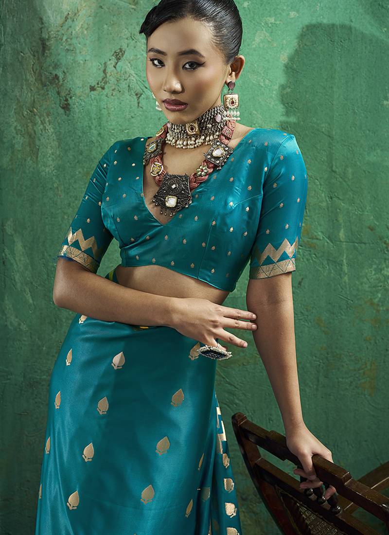 Teal blue satin silk blend saree with gold zari buti