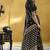 Black satin silk blend saree with gold zari buti