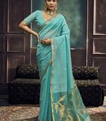 Aqua blue linen silk blend saree with gold zari border & floral pallu