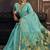 Aqua blue linen silk blend saree with gold zari border & floral pallu