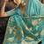 Aqua blue linen silk blend saree with gold zari border & floral pallu