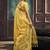 Yellow linen silk blend saree with gold zari border & floral pallu
