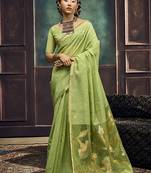 Light green linen silk blend saree with gold zari border & floral pallu