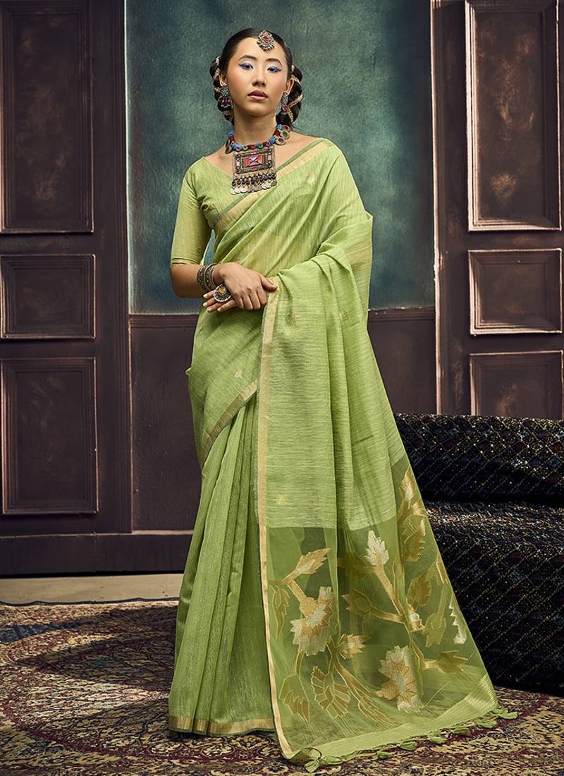 Light green linen silk blend saree with gold zari border & floral pallu