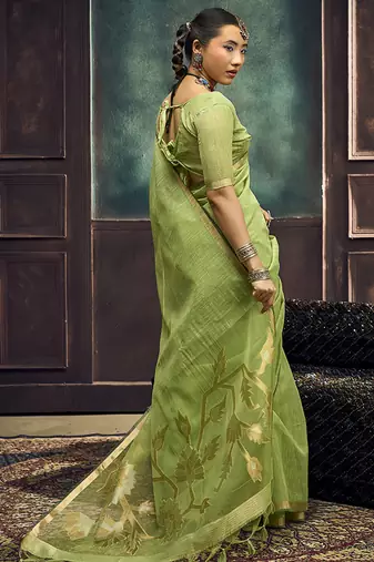 Light green linen silk blend saree with gold zari border & floral pallu