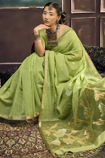 Light green linen silk blend saree with gold zari border & floral pallu