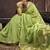 Light green linen silk blend saree with gold zari border & floral pallu