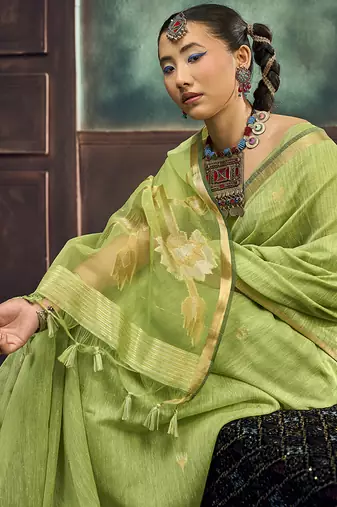 Light green linen silk blend saree with gold zari border & floral pallu