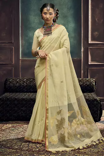 Cream linen silk blend saree with gold zari border & floral pallu