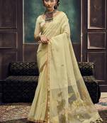 Cream linen silk blend saree with gold zari border & floral pallu