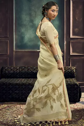 Cream linen silk blend saree with gold zari border & floral pallu