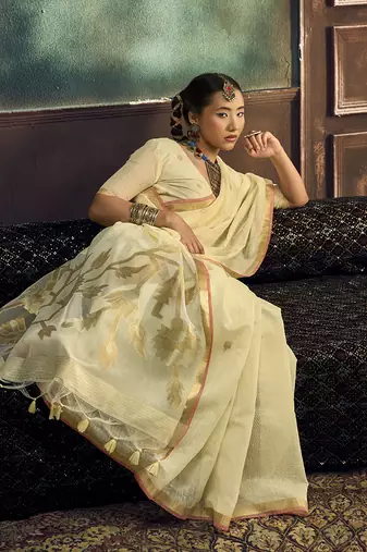 Cream linen silk blend saree with gold zari border & floral pallu