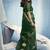 Dark green linen silk blend saree with gold zari border & floral woven pallu
