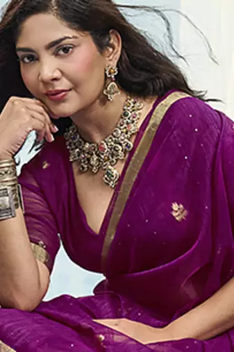 Magenta linen silk blend saree with gold zari border & floral woven pallu